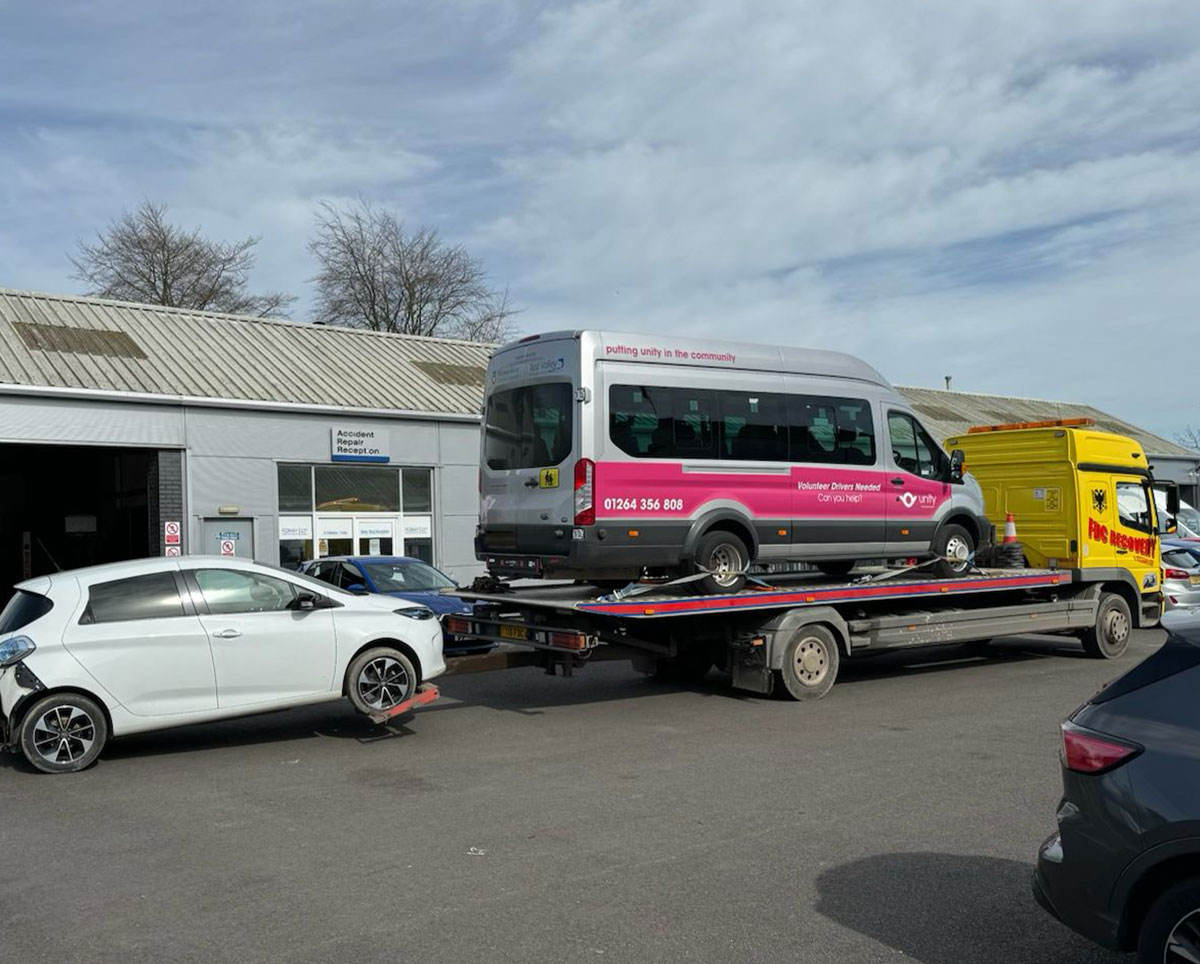 Community minibus loaded onto FDC recovery flatbed in Salisbury