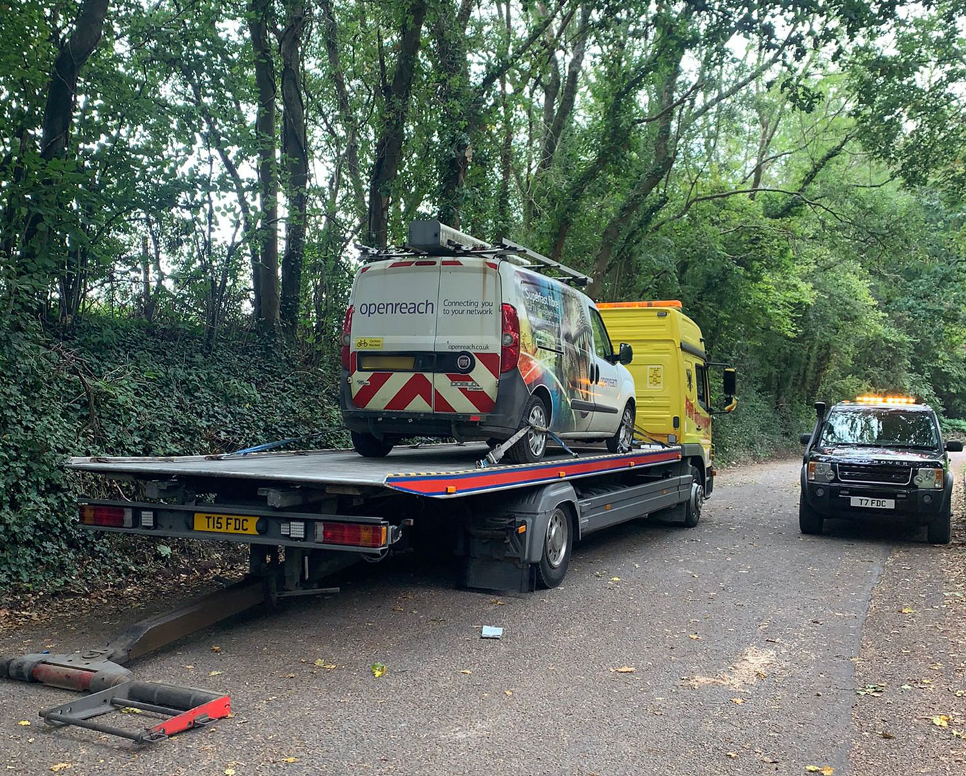 Openreach van being recovered on a rural Wiltshire road